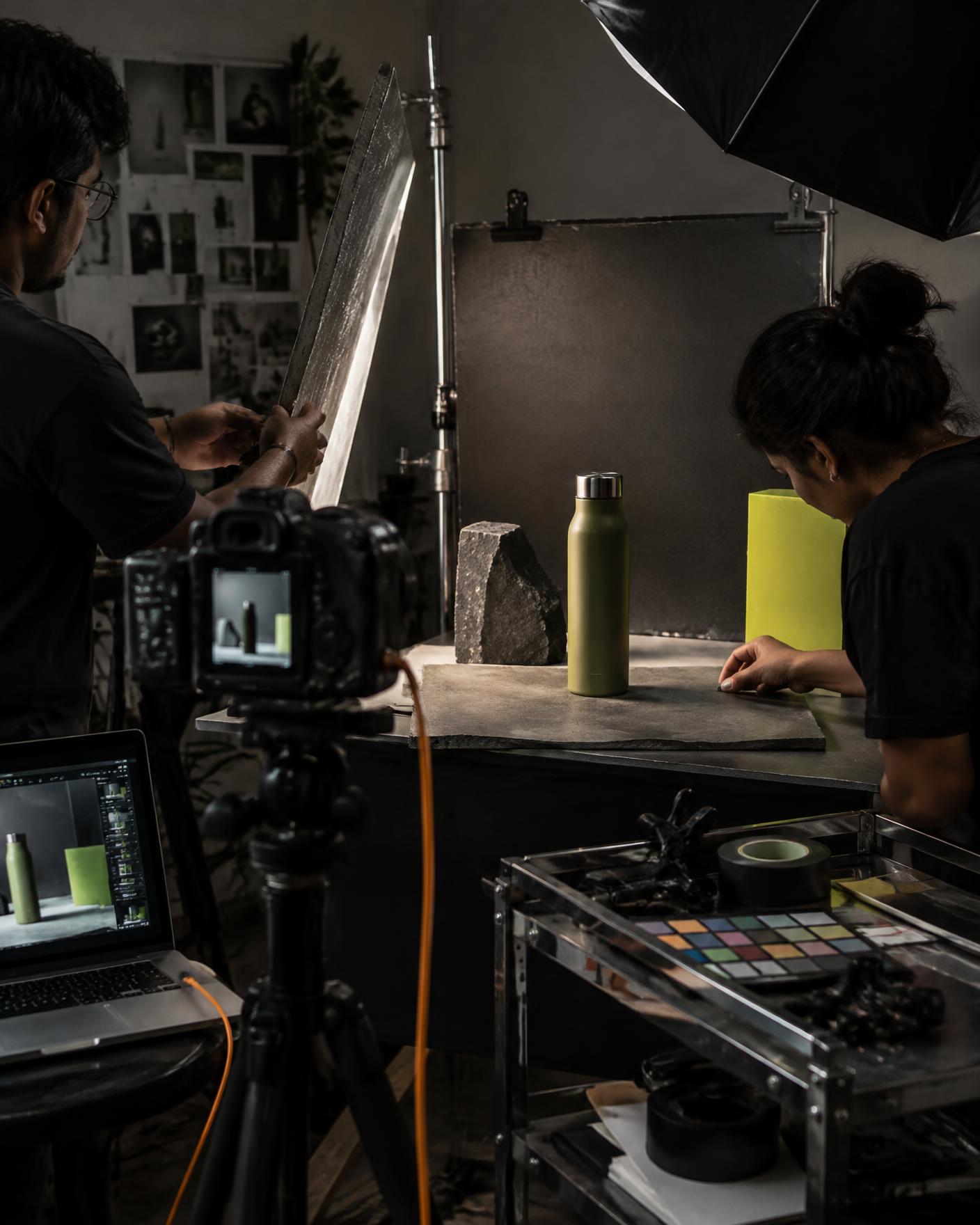 A small agency team preparing an unbranded product shoot